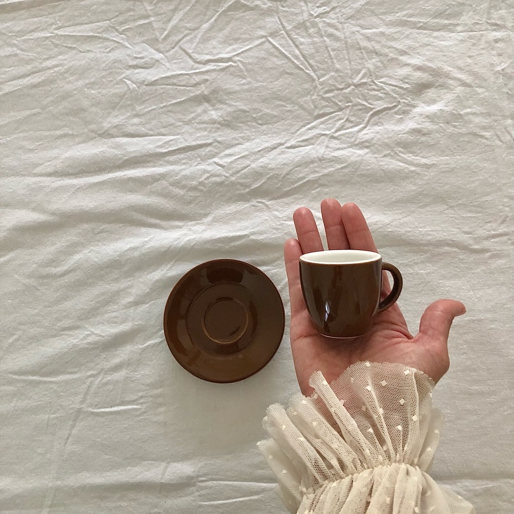 Small brown coffee cup